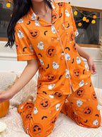 Jack-o'-lantern button-down pajama set in orange