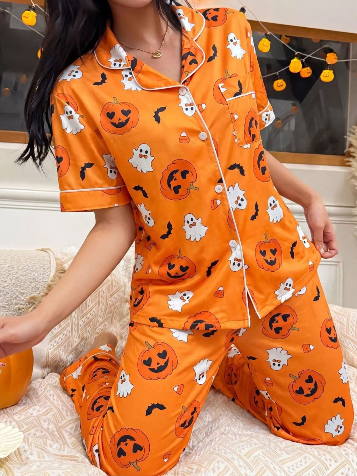 Jack-o'-lantern button-down pajama set in orange
