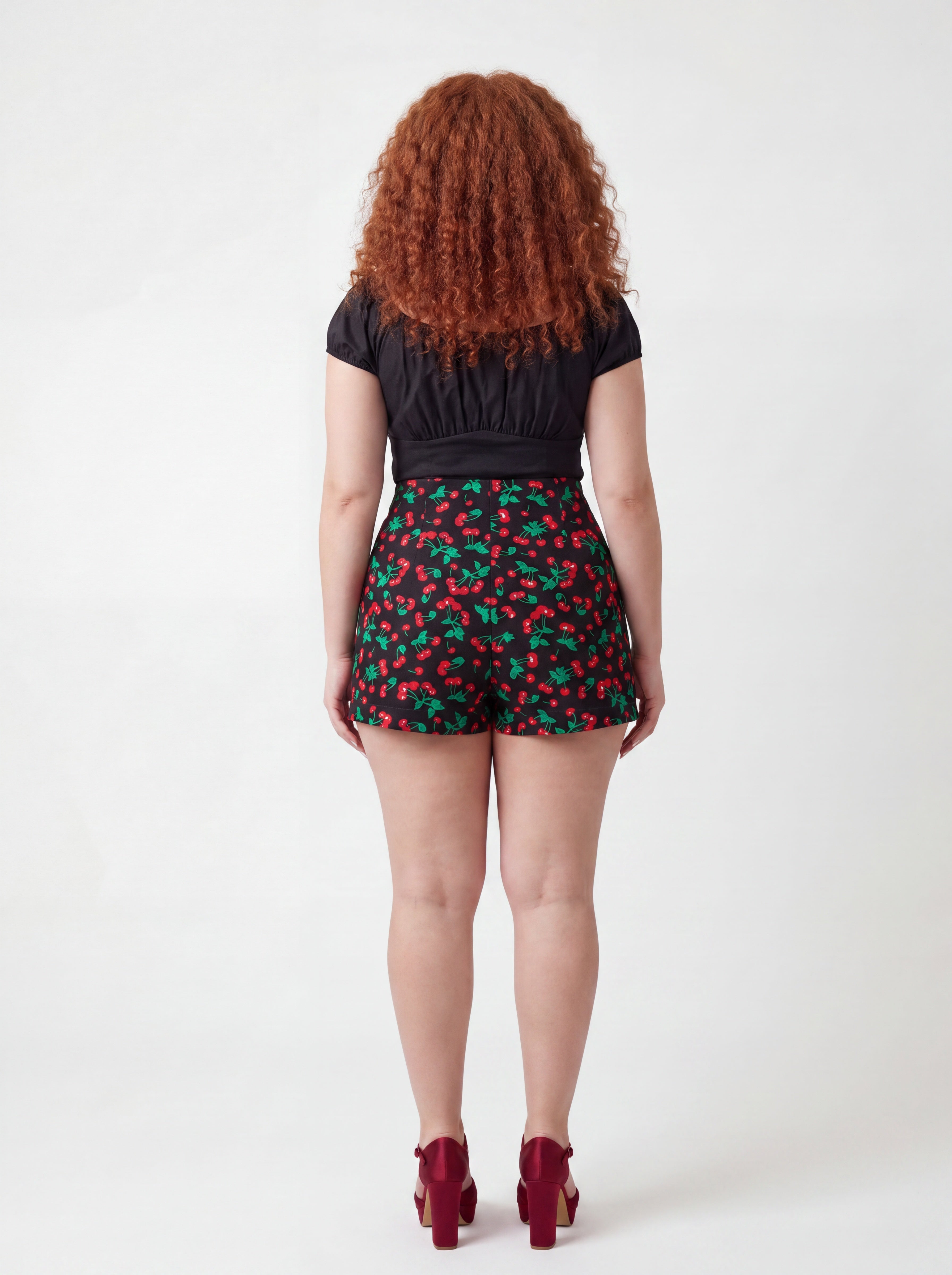 LB high-waisted shorts in black vintage cherries print by Pinup Girl Clothing, sizes XS to 5X.