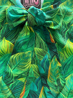 Leaves Bow Top in a green leaf print with an oversized neck bow