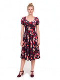 Lucrezia Day Dress in Burgundy Ambrosia Floral, cream and pink roses with red carnations and blue cornflowers on deep wine red crepe, deep sweetheart neckline and short puff sleeves