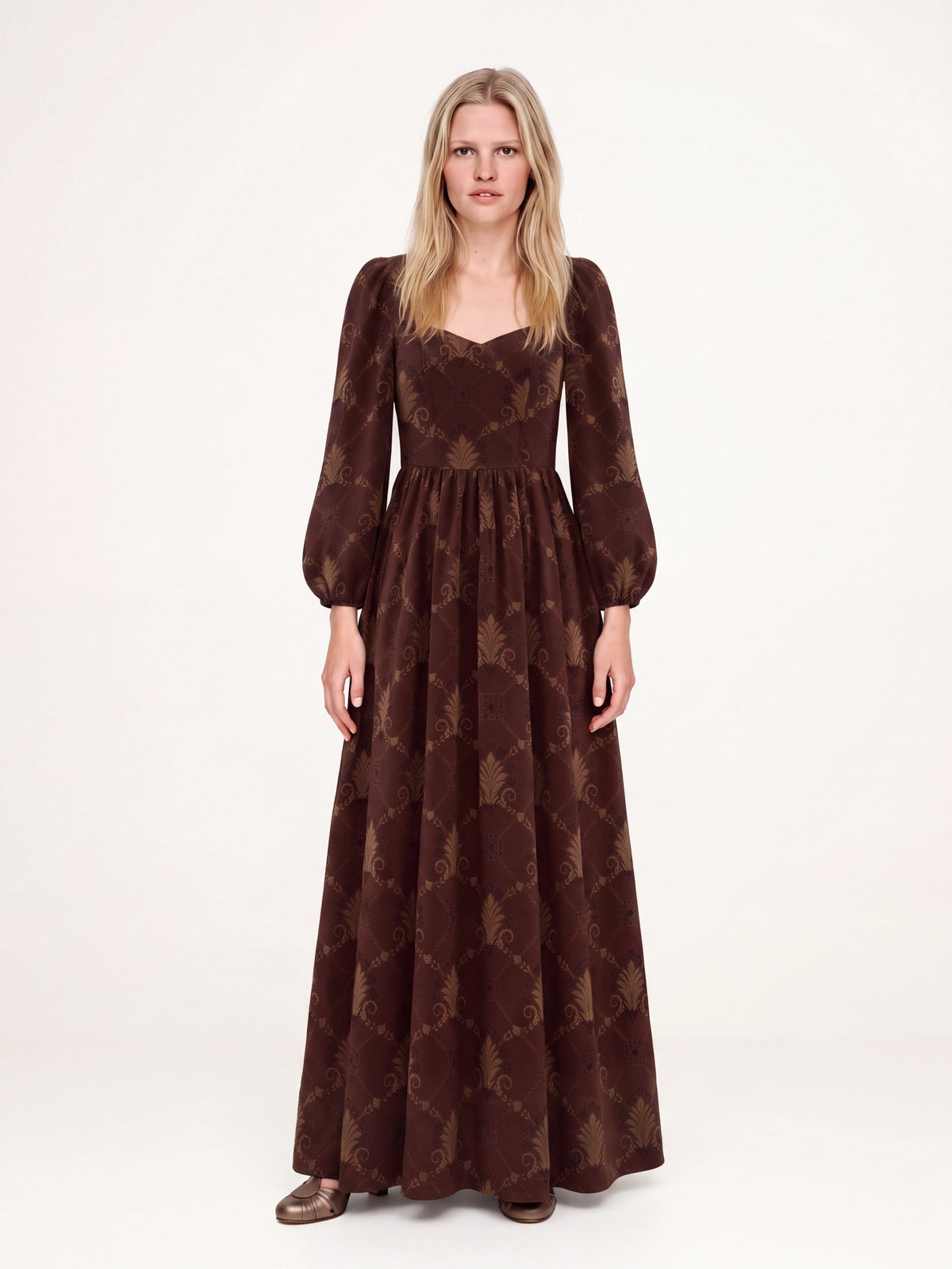 Lucrezia Renaissance Maxi Gown in Brown Grand Trianon, gold palmette print on chocolate brown with a sweetheart neckline and bishop sleeves, front view, Pinup Girl Clothing, XS to 5X