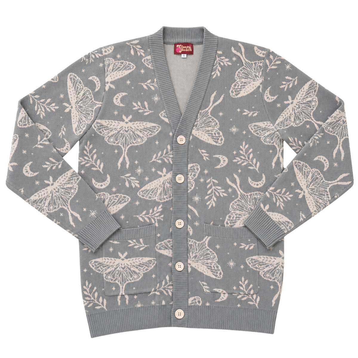 Luna Moth Cardigan laid flat, light gray knit with cream luna moths, ferns and stars and cream buttons