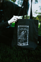Lunar Witch Tote Bag, black organic cotton tote with white moon witch art