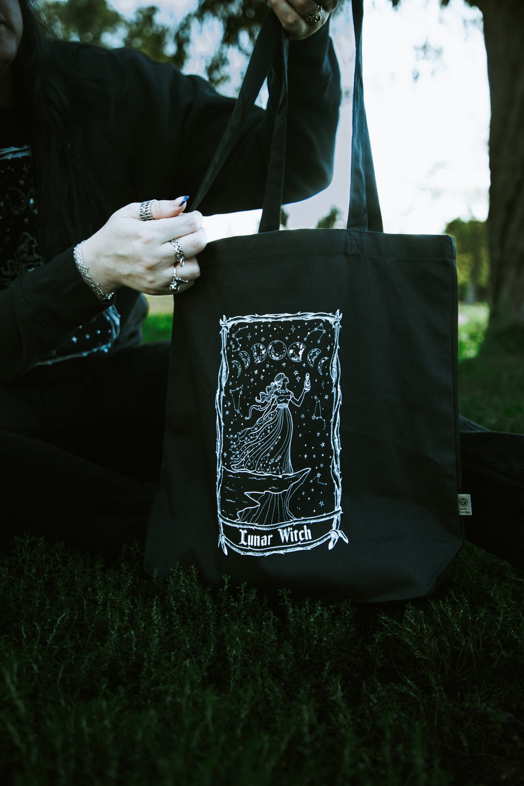 Lunar Witch Tote Bag, black organic cotton tote with white moon witch art
