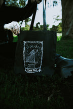 Lunar Witch Tote Bag, black organic cotton tote with white moon witch art