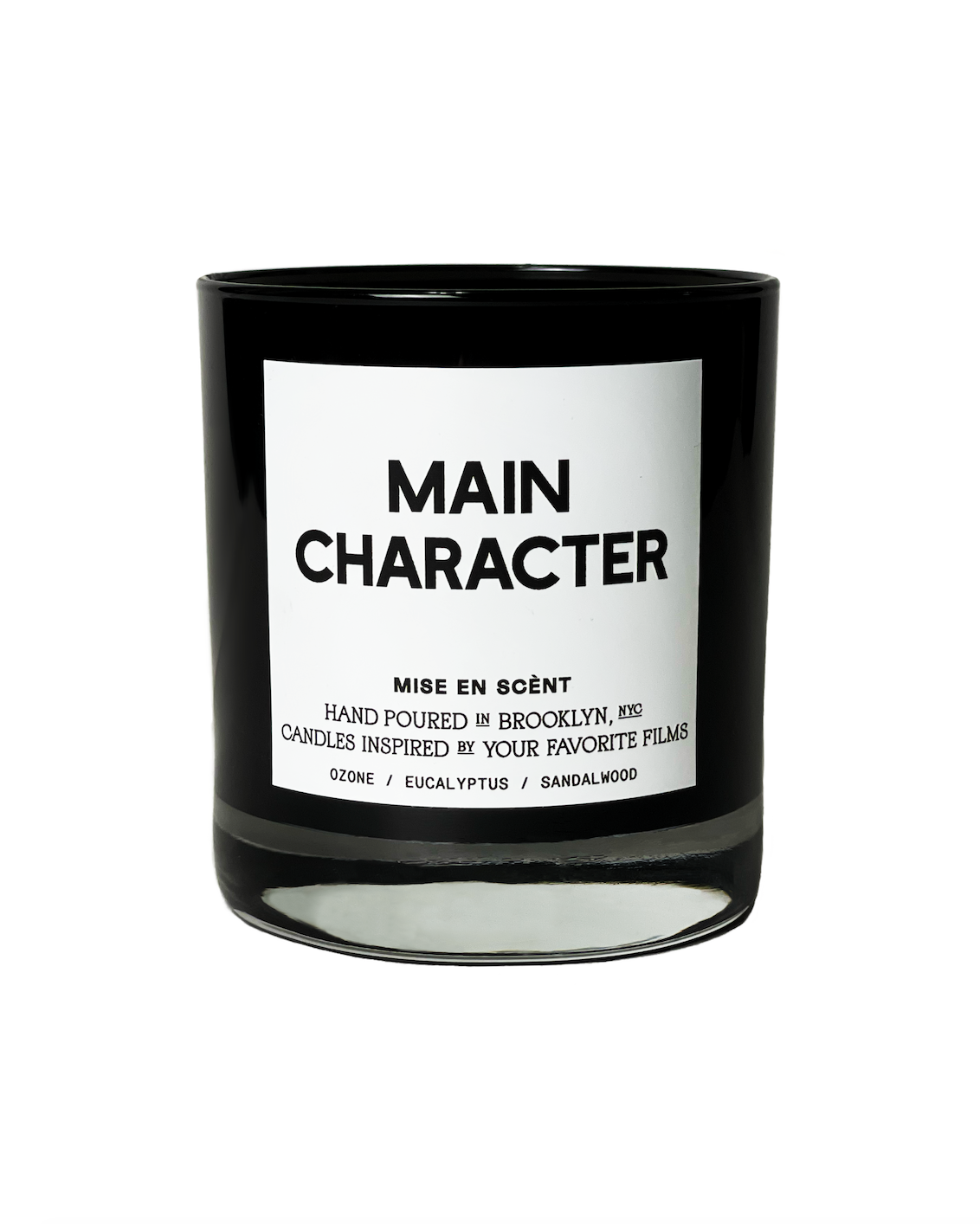 Main Character scented soy candle in a black glass jar