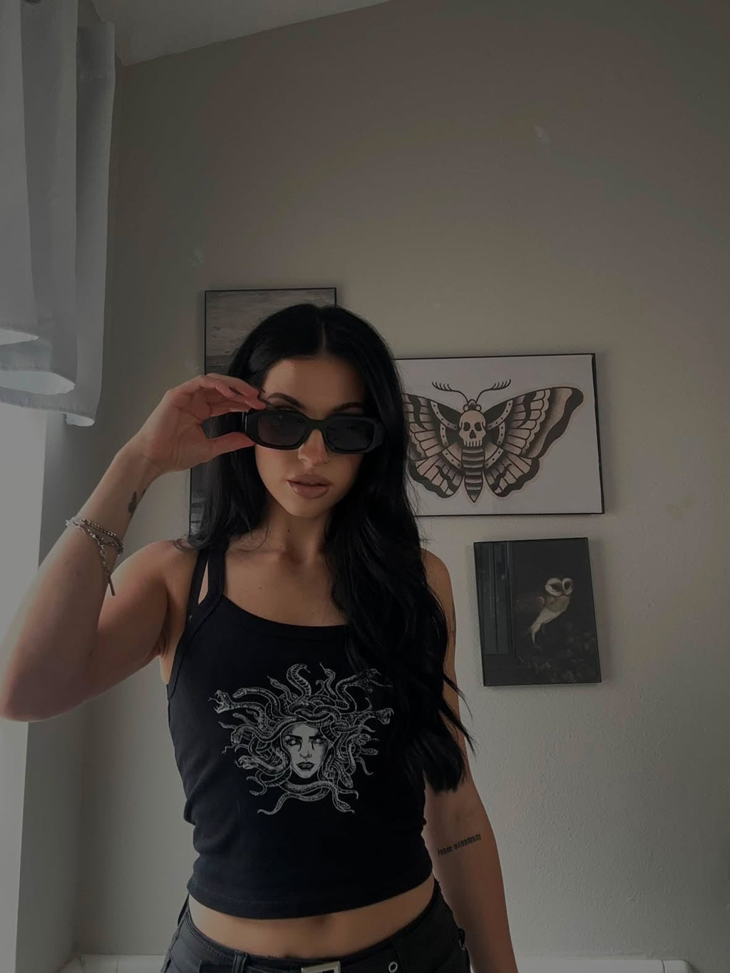 Medusa Graphic Tank, a fitted black tank with a Medusa print