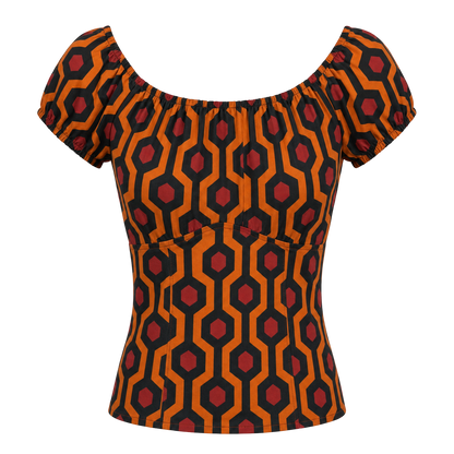 The gathered vintage peasant top in the orange and black Hotel Hexagon print on an invisible mannequin, showing the elasticized neckline and short puff sleeves