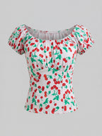 Ivory vintage cherries peasant top, ghost-mannequin view, by Pinup Girl Clothing, sizes XS to 5X.
