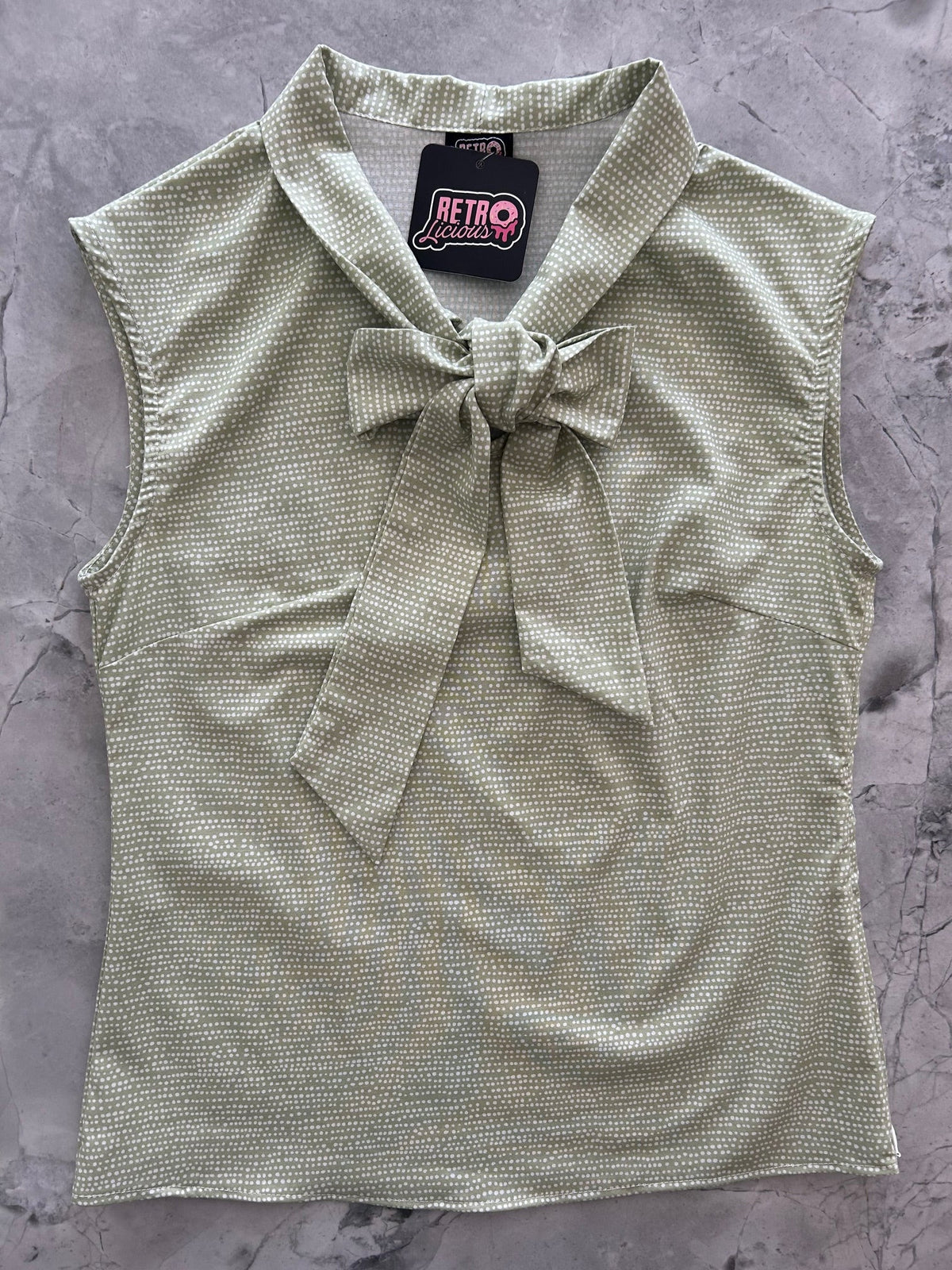 Sage Dot Bow Top in sage green cotton with an oversized neck bow