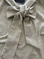 Sage Dot Bow Top in sage green cotton with an oversized neck bow