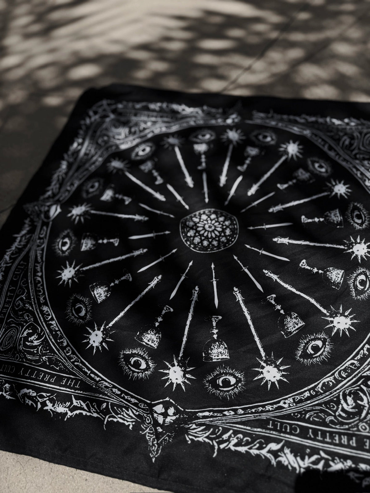 Sigil Print Square Scarf in black with a white occult sigil wheel