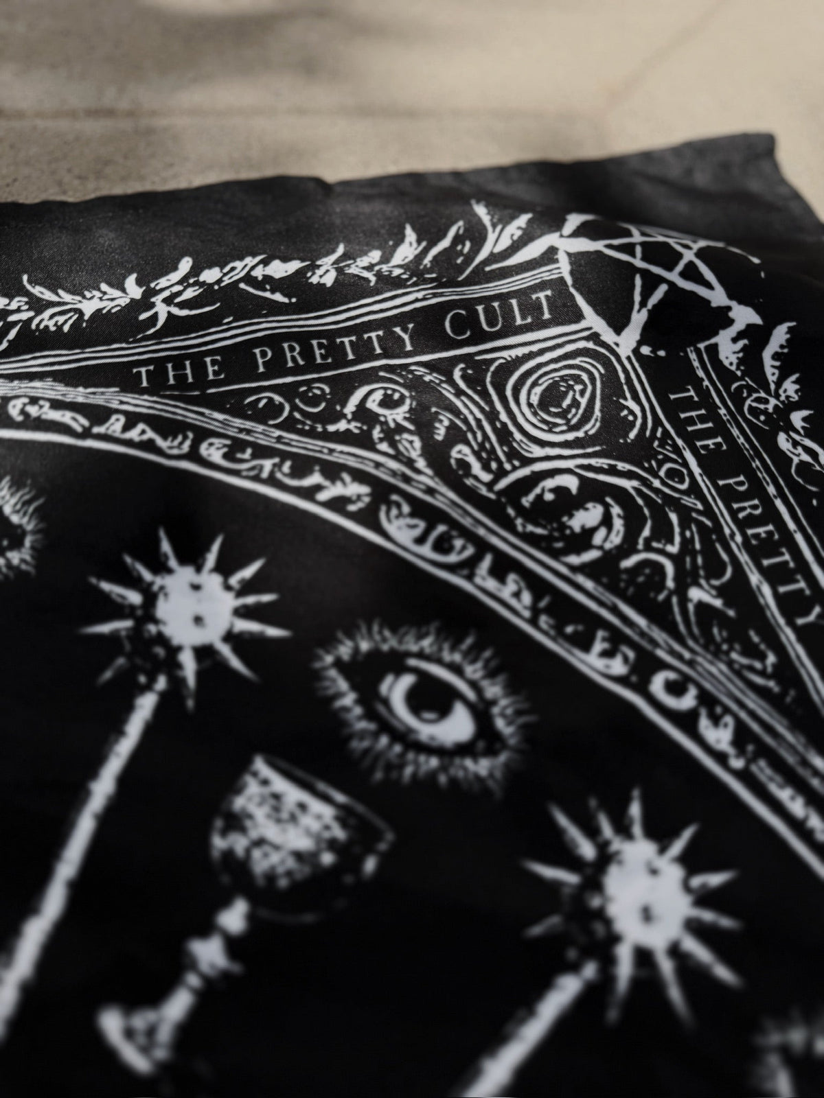 Sigil Print Square Scarf in black with a white occult sigil wheel