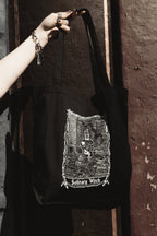 Solitary Witch Tote Bag, black organic cotton tote with white witch art