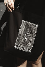 Solitary Witch Tote Bag, black organic cotton tote with white witch art