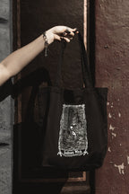 Solitary Witch Tote Bag, black organic cotton tote with white witch art