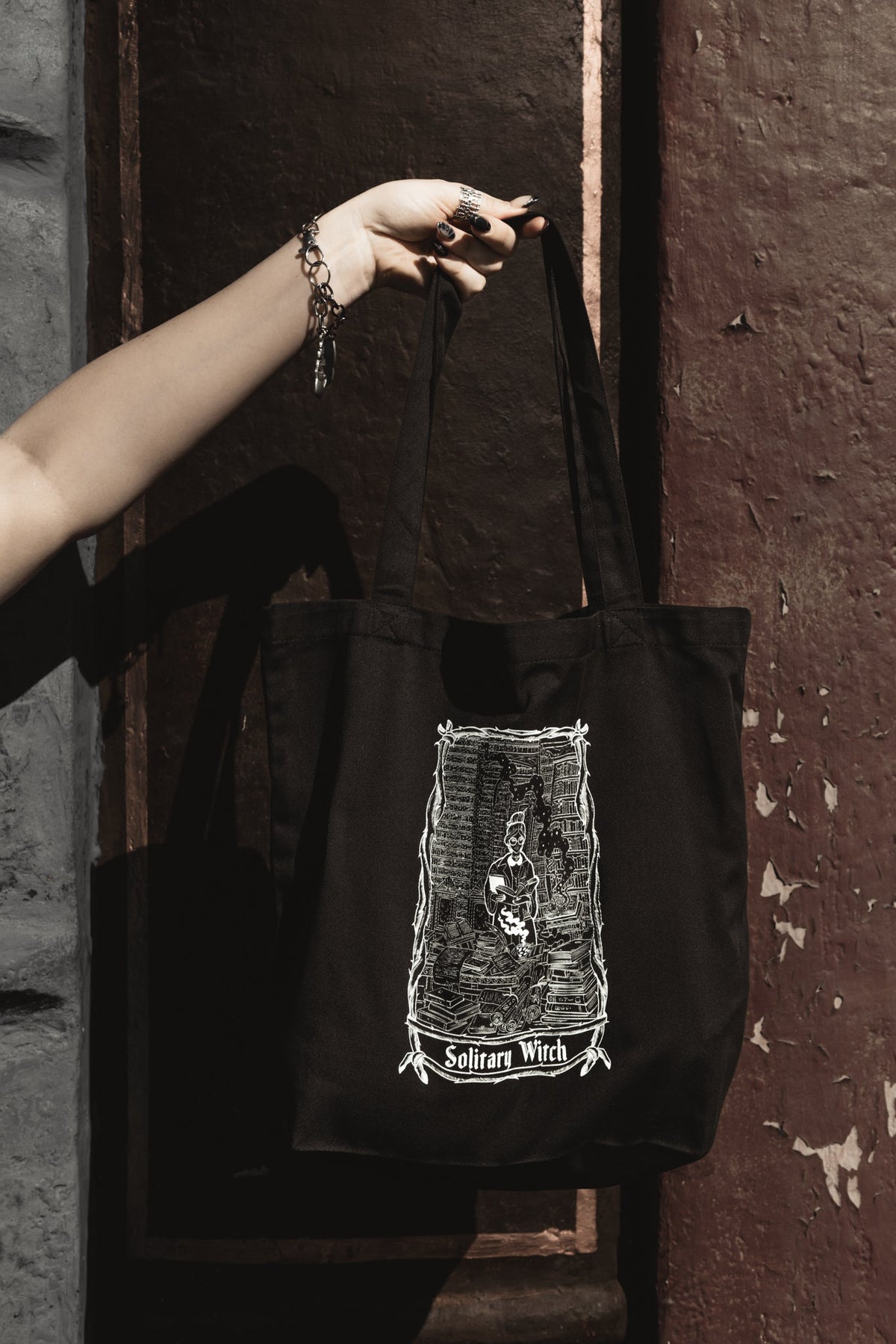 Solitary Witch Tote Bag, black organic cotton tote with white witch art
