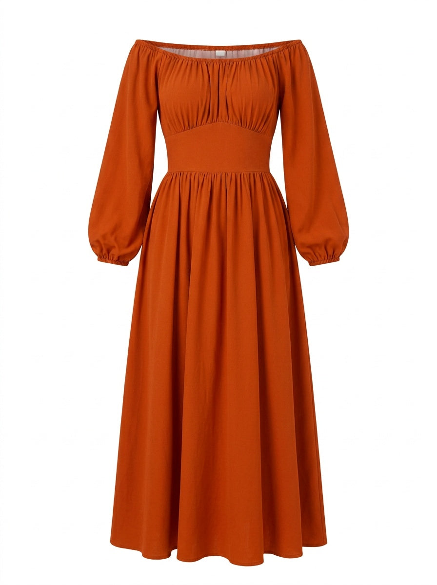 Swann Maxi Dress in Amber Harvest on a mannequin, gathered off-shoulder bodice with long blouson sleeves and a full gathered maxi skirt