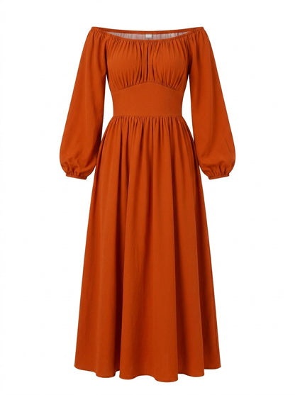 Swann Maxi Dress in Amber Harvest on a mannequin, gathered off-shoulder bodice with long blouson sleeves and a full gathered maxi skirt