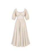 Coconut Milk Swann Maxi Dress shown flat, gathered peasant bodice with puffed sleeves and a floor-length gathered skirt in warm off-white crepe