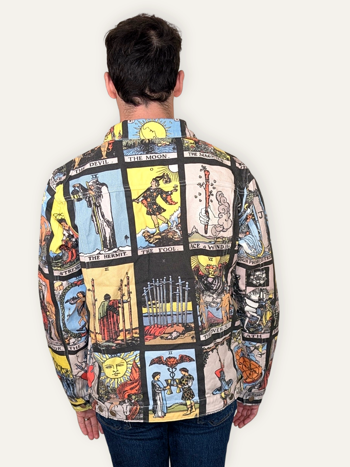 Back view of the Tarot Card Denim Jacket showing the tarot card grid print
