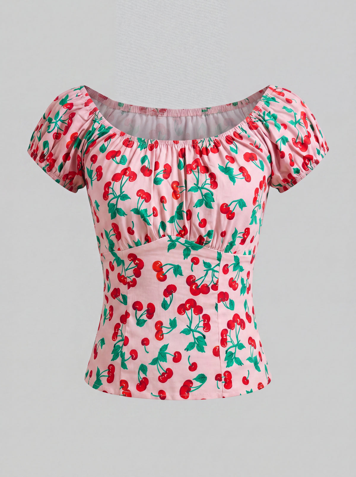 The vintage cherries peasant top in pink by Pinup Girl Clothing, sizes XS to 5X.