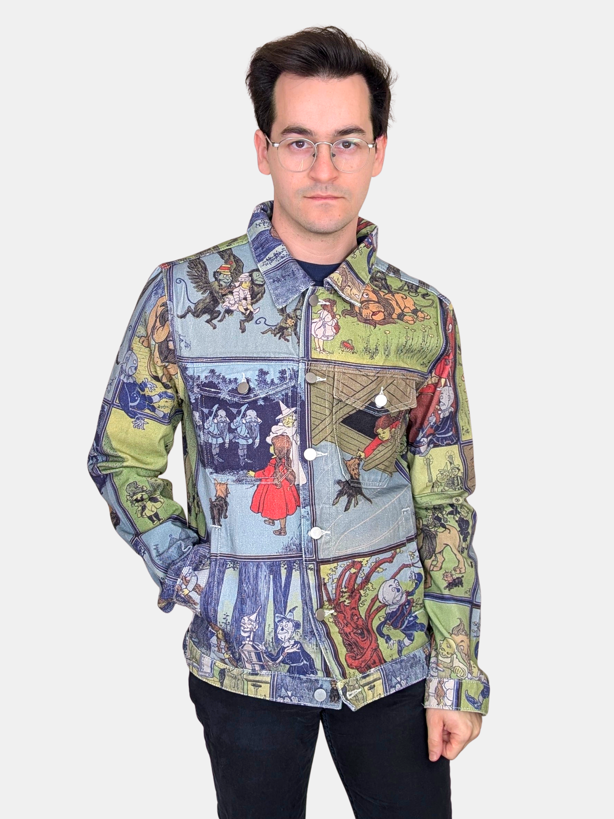 Front view of the Wizard of Oz Denim Jacket buttoned, with Dorothy and Toto on the chest