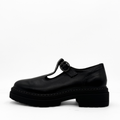 Zola black leather T-strap Mary Jane with a lug sole platform