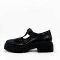 Zola black patent leather T-strap Mary Jane with a lug sole platform