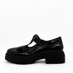Zola black patent leather T-strap Mary Jane with a lug sole platform