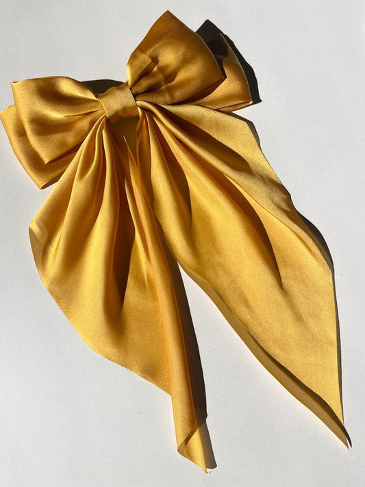 Clara Large Satin Hair Bow Clip  in Golden Yellow