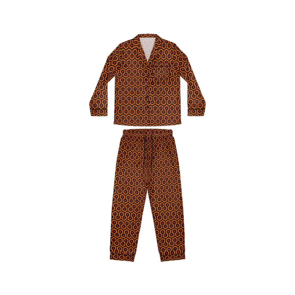 A two-piece pajama set with a button-up shirt and matching pants, featuring an all-over geometric hexagon print in shades of orange and brown.