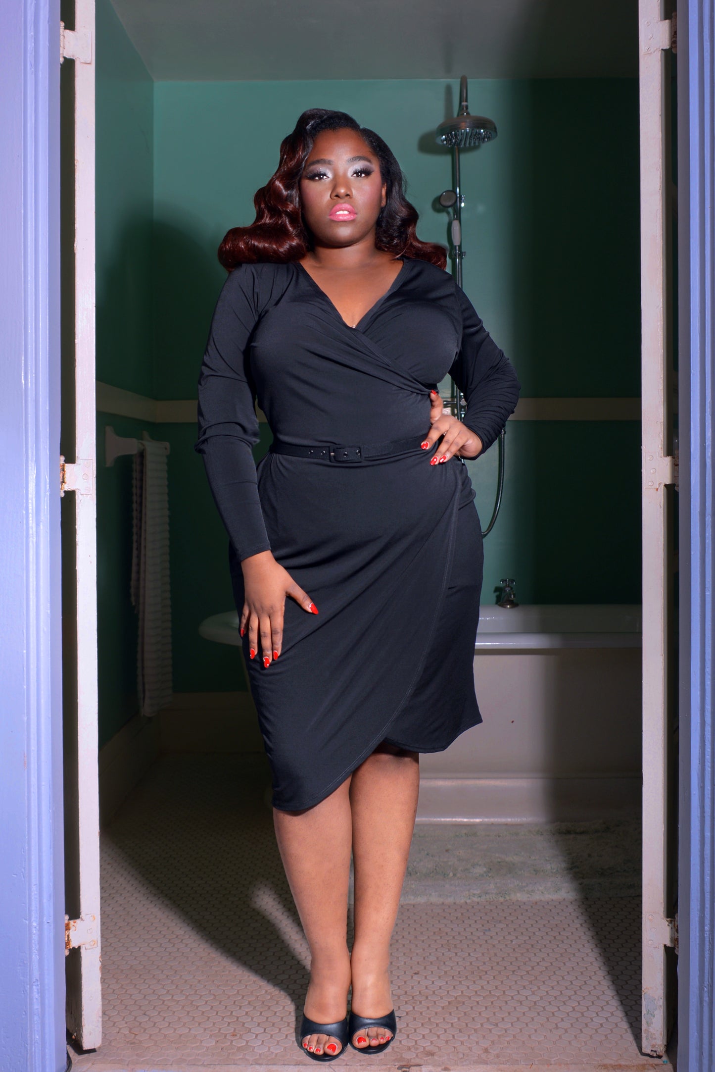 Greta Long Sleeved Faux Wrap Wiggle Dress in Black Jersey | Laura Byrnes Design