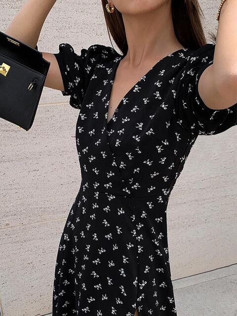 Annette Surplice Faux Wrap Dress with Side Slit in Black & White Bow Print | Poundton