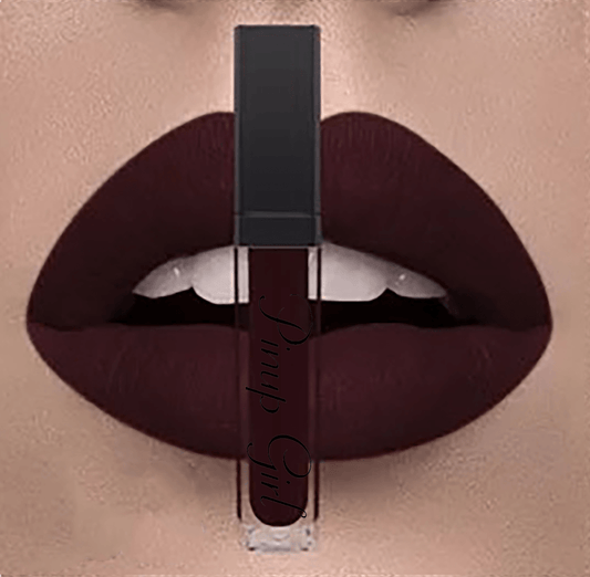 Pictured is a swatch of the Pinup Girl Clothing no smudge liquid matte lipstick in Lilith's Kiss Burgundy