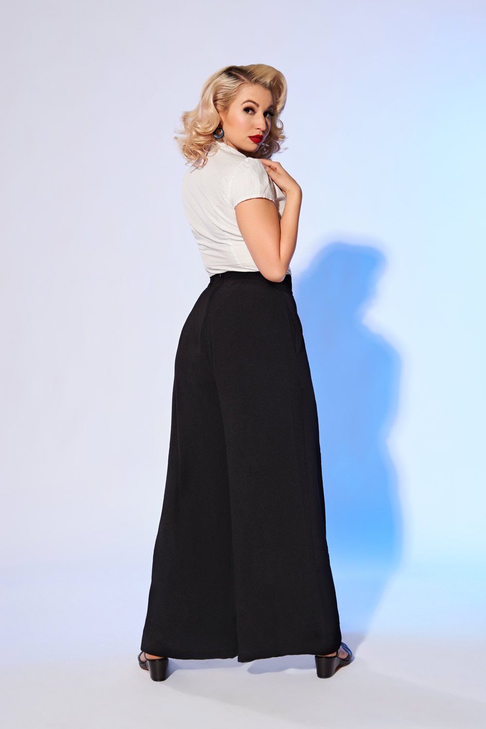 Pinup Girl Clothing favorite Dietrich vintage inspired wide leg trouser palazzo pants with pockets made of high quality stretch crepe in black 30" inch inseam